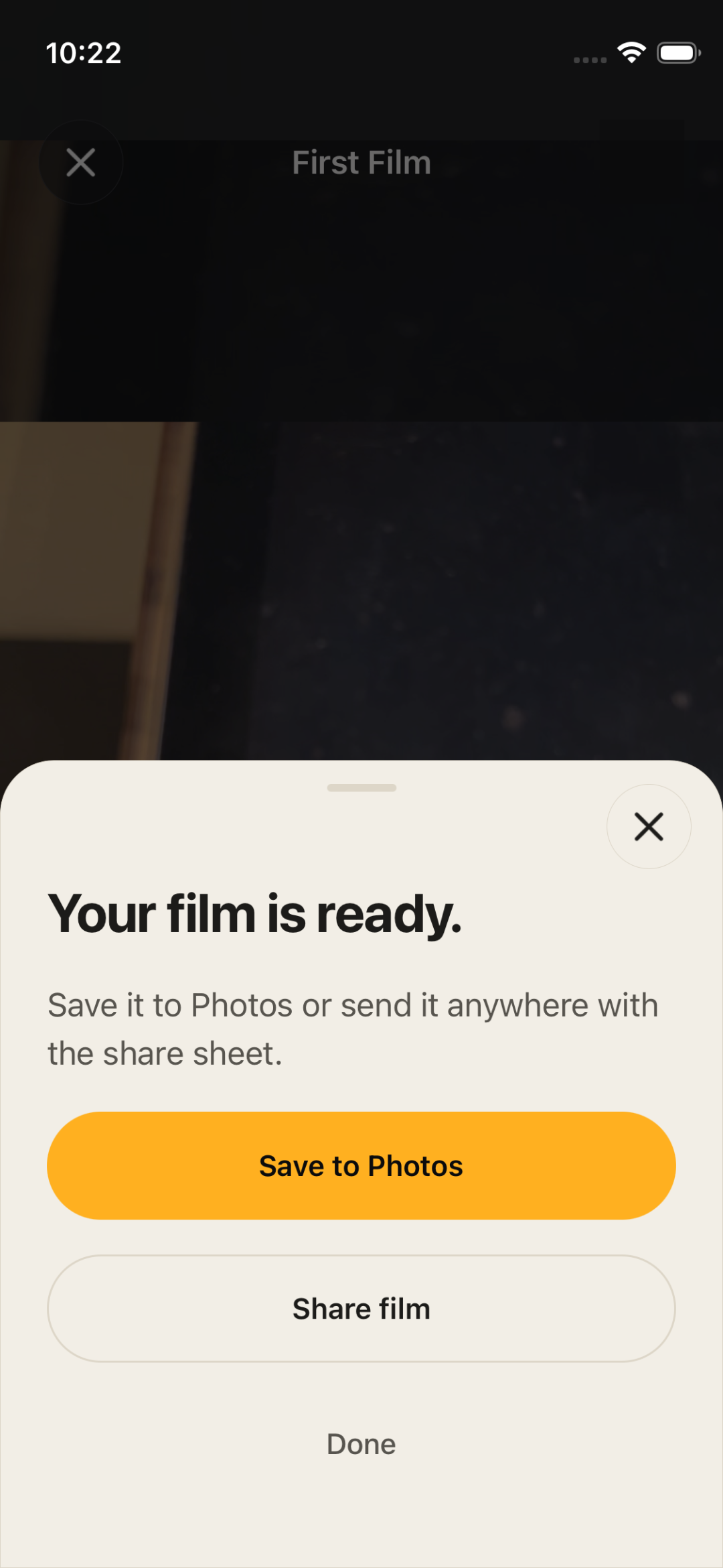 The finished-film screen with Save to Photos and Share film actions